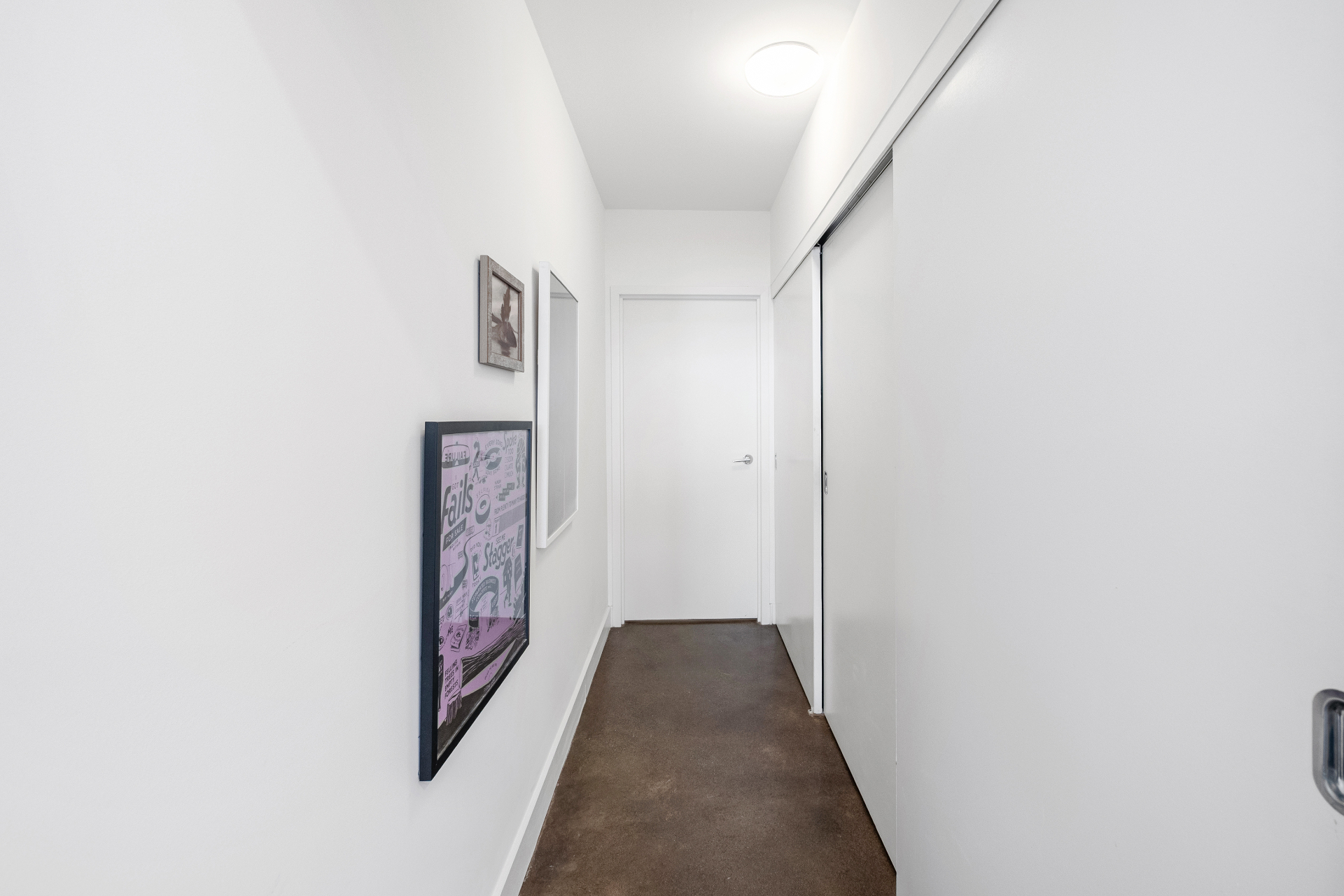 Hallway with framed art