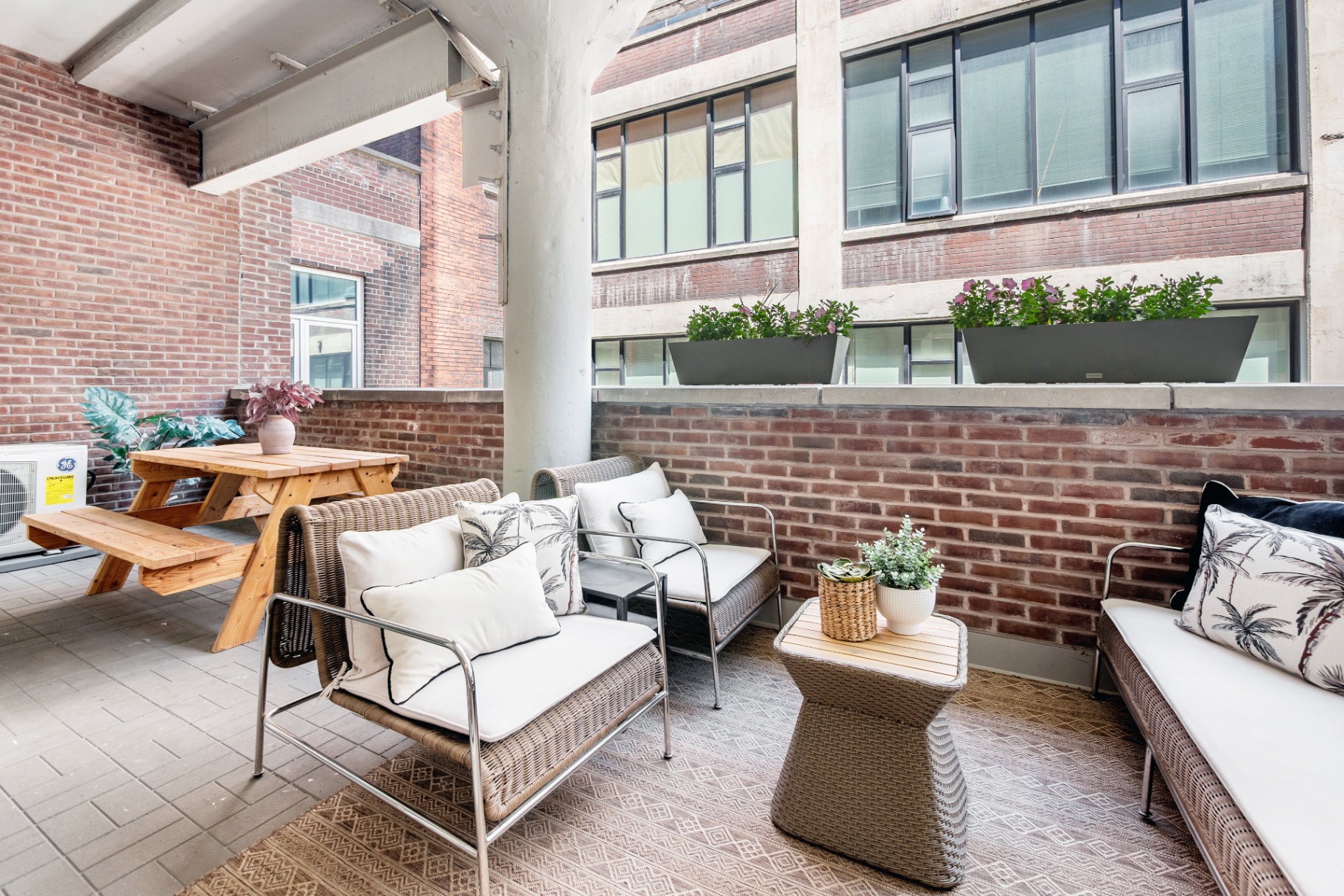 Terrace with picnic table and lounge area