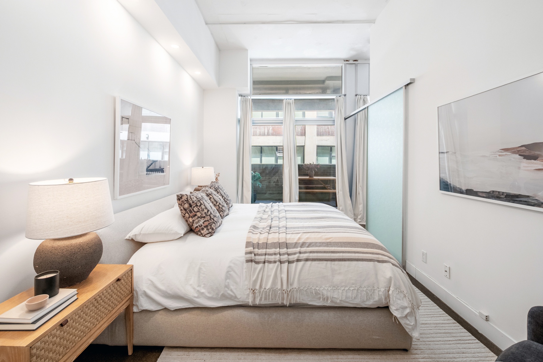 Second bedroom with window and curtains