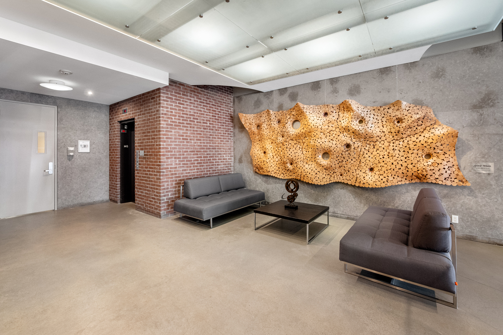 Lobby seating with Spirit Wave wood sculpture