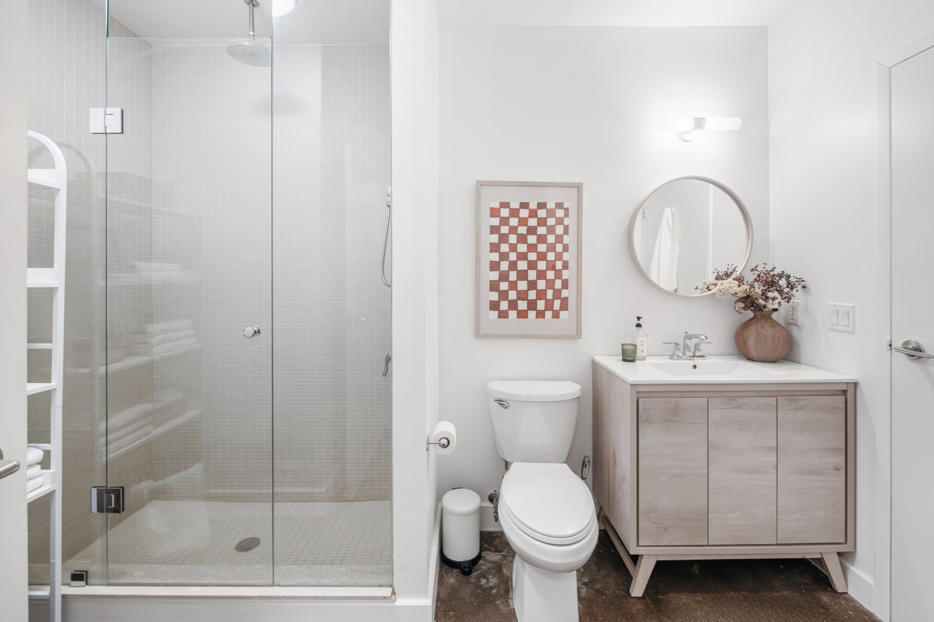 Bathroom with glass shower and vanity