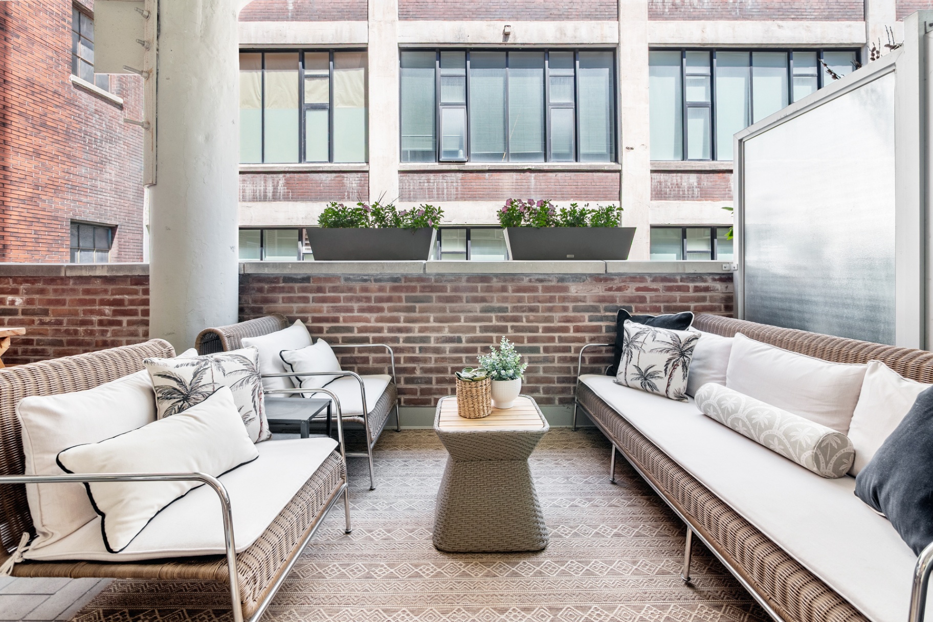 Private terrace with wicker lounge seating
